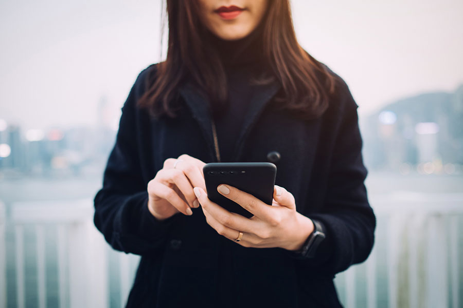 getty-woman-with-cell-phone.jpg