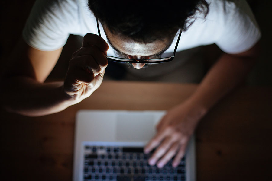 getty-dark-room-with-laptop.jpg